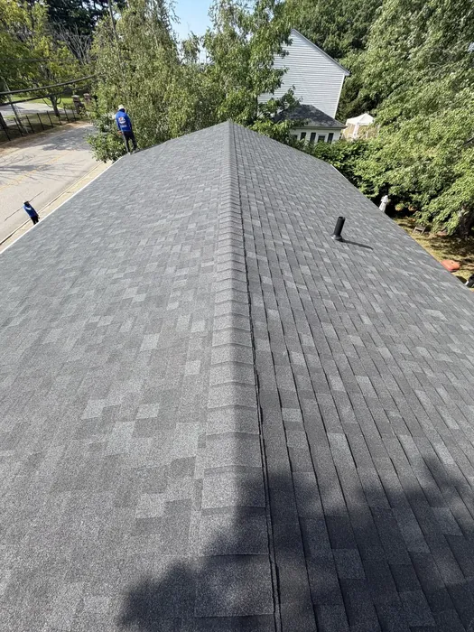 Aerial view of a freshly completed roof replacement