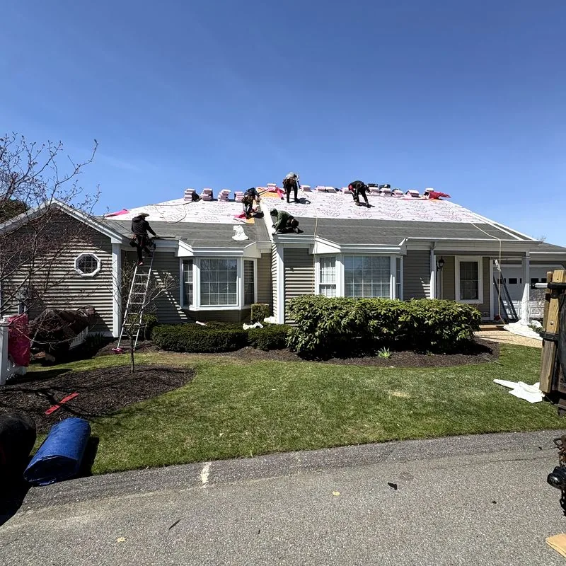 A-Z Roofing crew mid-project on a ranch home