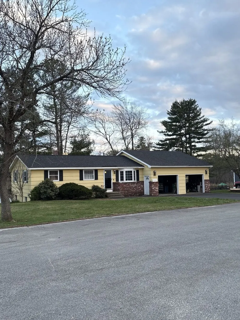 Completed roof replacement by A-Z Roofing with new architectural shingles